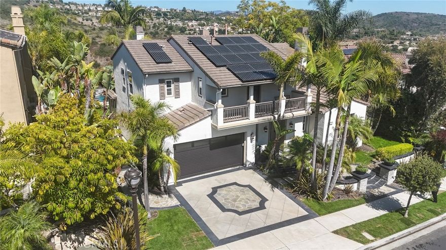 Welcome to 36 Via Divertirse, a stunning Mediterranean-style estate in Talega’s Mirador enclave. This 6-bed, 5.5-bath home spans 4,831 sq ft on a 9,862 sq ft lot, designed for luxury and functionality. Enjoy formal living and dining rooms, a guest suite, private office, and detached casita. The chef’s kitchen boasts Caesarstone counters, 6-burner Wolf range, dual ovens, warming drawer, breakfast nook, and walk-in pantry, opening to a spacious great room with fireplace. Upstairs features a luxurious primary suite with fireplace, balcony, spa-style bath, and 3 ensuite bedrooms plus loft, bonus room, and laundry. The backyard offers a large heated pool with waterfall and swim-up bar, spa, and a cabana with BBQ, fridge, sink, and keg tap. A fenced side yard serves as a dog run. Additional highlights: walnut floors, dual-zone HVAC, whole-house fan, 3-car garage. Steps from Talega Swim & Athletic Club, parks, shops, golf, and top-rated Capistrano schools.