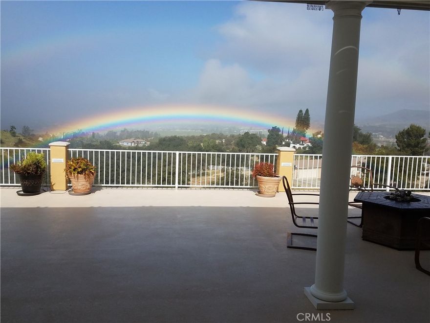 Welcome Home to this original owner gated custom home! Views! Views! Views! Featuring over 7500 square feet of total usable living space. The main level boasts over 3800 square feet with 3 spacious bedrooms, 3.5 bathrooms, an office/den, family room with fireplace, formal living with fireplace, formal dining room, huge laundry room with tons of storage, chef’s kitchen with breakfast bar/nook, walk-in pantry and large island with prep sink. The fully finished basement/living space includes a full bath and boundless opportunities. Currently the basement is set up with an expansive bar, game room, gym, and workspace. This custom-built estate is situated on over 5 acres of land for endless views and privacy. There is a total of 8 garage spaces (3 spaces attached to the home), 1 enclosed RV garage, and 2 covered RV spaces. Low-cost solar to keep electricity prices down. Off of the kitchen/family room is a ginormous deck equipped with built-in fire pit and BBQ that is simply stunning! Extreme pride of ownership and no expense spared! Such an elegant home with all of the extra eye for details embracing crown molding, wainscoting, grand pillars, neutral decor, custom cabinetry and built-ins with so much storage. Located just outside of the Glen Oaks Hills HOA on a paved street. Come see this beauty today, you won’t be disappointed!