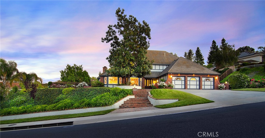 Welcome to this exceptional residence nestled in the prestigious Morrison Highlands community. Situated on a spacious lot with panoramic views, this beautifully upgraded home offers the ultimate in comfort, technology, and indoor-outdoor living.
Enjoy resort-style amenities in your expansive backyard featuring a sparkling pool and spa, gazebo with lighting, lush lemon and grapefruit trees, a fire pit, and a natural gas BBQ. A removable pool fence ensures flexibility for family fun or elegant entertaining.
Inside, the completely remodeled chef’s kitchen is a culinary dream, boasting custom maple cabinetry, quartz countertops, a large center island with sink and storage, and premium Wolf and LG Signature appliances—including four ovens, a built-in steam convection oven, and a see-through refrigerator with an auto-opening door. A butler’s pantry adds even more functionality.
The luxurious upstairs primary suite is a true retreat, with a private balcony, a custom walk-in closet with built-in dresser, and a spa-inspired bathroom complete with soaking tub, steam shower, dual water closets, and Toto bidet washlets.
This home also features a professionally built, 10-seat home theater—featured in two audio-video magazines—fully equipped with smart iPad controls. The theater equipment was upgraded just four years ago.
Designed with smart living in mind, the home includes motorized shades in the primary bedroom, a Ring alarm system, smart controls for lighting, thermostats, irrigation, and pool equipment, as well as digital locks on all exterior doors. The garage is wired for EV charging and supported by owner-owned solar panels.
Located in the highly regarded Las Virgenes School District, this rare offering blends luxury, innovation, and timeless comfort in one of the area’s most coveted neighborhoods.