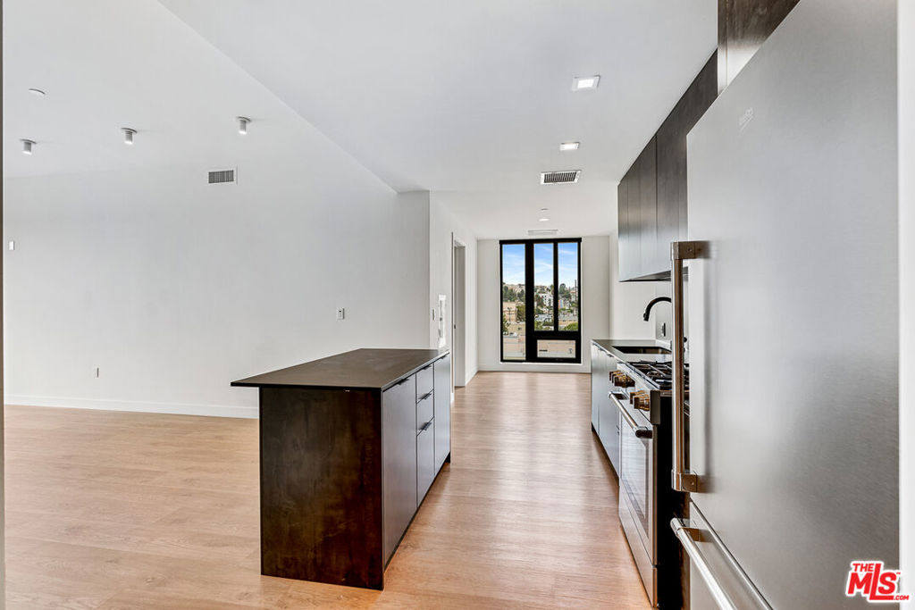 Welcome to Arya, located in the Palms/Culver City neighborhood. Residence 422 is a 2x2 layout available on the 4th floor, with views facing North West towards the city. Kitchen has dark finishes with granite countertops, stainless steel appliances including dishwasher, fridge, and gas oven/stove. Residence includes custom closets in the bedrooms, electronic blackout window shades, nest thermostat, and smart lights. A dining area or office space available by the kitchen. Property uses Latch OS for smart access using your phone. Property amenities include fitness center with Technogym equipment, co-working lounge, conference room, and a spacious rooftop with 2 BBQs, games, and amazing views of the city. Parking is available at $150/month for a single space only, and Internet is $84/month. Additional parking based on availability. Contact us today!