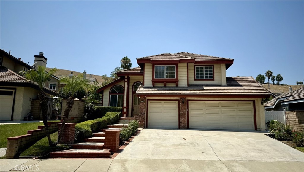 Don't miss this 4 bedroom/3 bath home located is the highly desirable Chino Hills community. Directly across from the Morningside park provides ample room for the whole family and entertaining! Welcome inside to a spacious downstairs that includes Cathedral ceilings, open living and dining room, kitchen opens to seperate family room. Downstairs features also include granite counter tops and upgraded cabinets in kitchen, guest bathroom, laundry room, direct acess to 3 car gargage and sliding doors that open to the tranquil backyard and patio to enjoy the peaceful hills day and night. Staircase leads up the catherdral ceilings to 4 bedrooms, inlcuding a master suite. New carpet and paint throughout. Close to shopping, dining and freeway access!