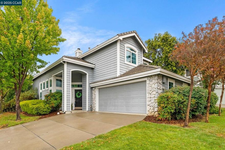 Stunning two story in Oak Hollow at Oakhurst Country Club nestled on a court location. Enter into the bright & airy living room featuring soaring ceilings, sunny windows flowing with natural light, a two-way fireplace & open flow to the formal dining area. Enjoy the eat-in kitchen with extended counter space, large windows with backyard views, slab granite countertops, ample cabinets & slider to the backyard. The spacious family room features an open flow from the kitchen & is adjacent to the updated half bath & laundry room. Upstairs enjoy the primary bedroom suite featuring vaulted ceilings & updated bath boasting a stall shower with tile surround, separate tub, dual sink/vanity plus walk-in closet. Two additional bedrooms upstairs plus an updated hall bath. The inviting backyard offers a patio area with built-in BBQ, professional hardscape and low maintenance landscape  Great location close to community pool, downtown and trails.