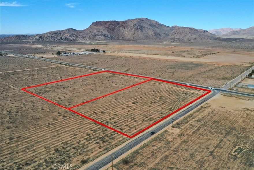 Discover endless possibilities with this rare opportunity to own two contiguous parcels totaling 8.819 acres in the unincorporated area of Apple Valley. Perfectly positioned with 633 feet of paved frontage on Highway 18 at the corner of Milpas Drive, this property combines high visibility with wide-open space and panoramic mountain views. Zoned RL-5 (Rural Living – 5 Acre minimum), the land is ideal for building your dream home, ranch, or desert retreat. With a conditional use permit, additional agricultural or commercial potential may be possible, making it an attractive option for investors and entrepreneurs seeking a high-traffic location. At night, enjoy breathtaking star-filled skies, and by day, take advantage of the open desert landscape – perfect for outdoor recreation, equestrian use, or off-road fun. Utilities are nearby, providing accessibility for future development. Whether you’re looking to develop, invest, or create your own private oasis, this property offers flexibility and value. GPS Coordinates: 34.47148, -117.10355 Sale includes these 2 parcels: APN: 0435-024-03-0000 & 0435-024-04-0000