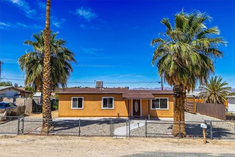 Photo of 74076 Casita Dr, 29 Palms, CA 92277 (MLS # JT26089598)