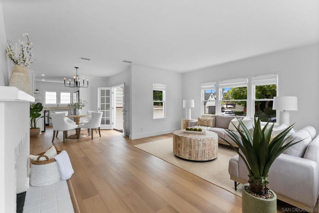 Enchanting Single-Level Coastal Cottage in Prime Beach-Barber Tract! Just three blocks from the iconic sands of Windansea Beach, this light, bright, and beautifully remodeled home is the perfect blend of coastal charm and modern comfort. Nestled in one of La Jolla’s coveted neighborhoods, this turnkey 2-bedroom, 1-bath gem offers a serene retreat with an unbeatable walkable lifestyle. Extensively remodeled with designer finishes and freshly painted inside and out, the home exudes pride of ownership. Both bedrooms are generously oversized, ideal for rest, work, or relaxation. Additional 250esf finished attic with easy retractable ladder access provides valuable bonus space for storage or creative use. The spacious yard invites outdoor living, the patio is perfect for al fresco dining and entertaining. A one-car garage offers secure parking, additional storage, or potential ADU expansion (R-2 zoned). Architectural plans available for expansion to 2 story beauty with ocean views from the second level. Just minutes from La Jolla’s charming village, farmer’s market, world-class beaches, shops, galleries, and renowned dining. This is a rare opportunity to own a slice of coastal paradise! "When viewing on a mobile device, scroll down to 'Property Facts and Features' and tap 'Show More' to access the stunning aerial video under the 'Virtual Tour' link."