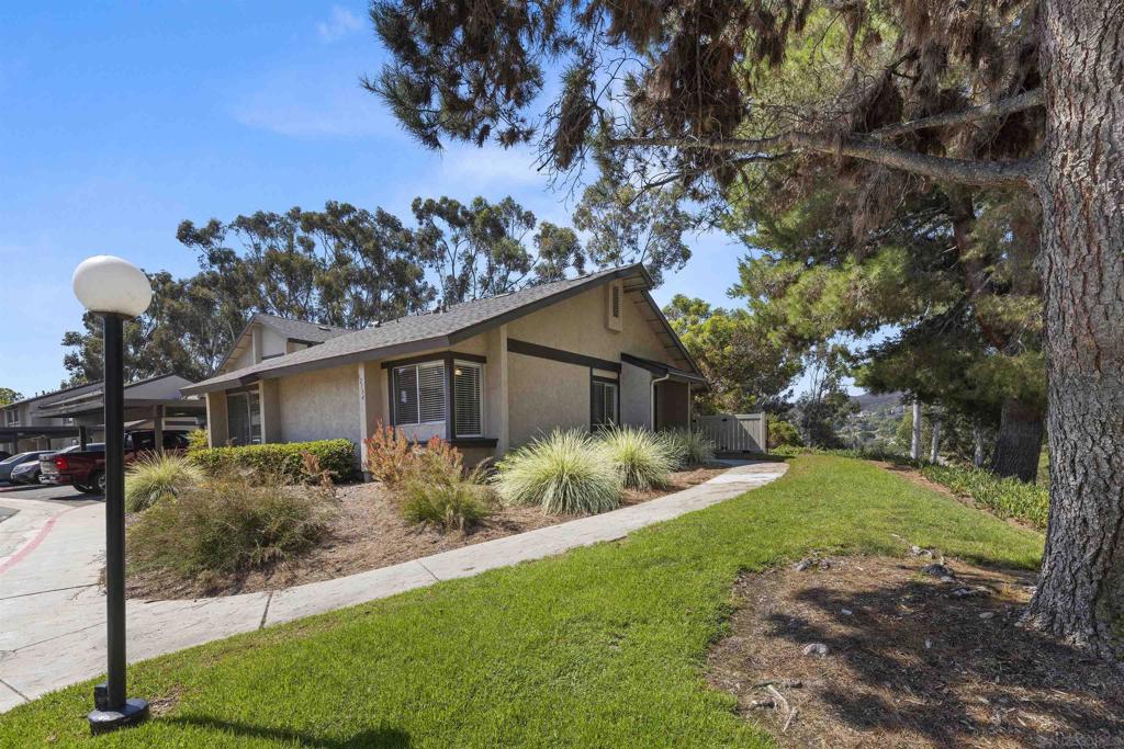 Welcome to Pomerado Pines- Single-Level Living in the heart of Poway. Discover the perfect blend of comfort and convenience in this beautifully updated 3BR/2BA end unit condominium that truly feels like a single family home. Located in the desirable Pomerado Pines Community of Poway, this home offers fresh style and modern touches throughout. Step inside to find freshly painted interiors and newly textured ceilings with the old acoustic finish removed for a crisp, contemporary feel. The living room and kitchen feature durable, stylish luxury plank vinyl flooring while the hallway and bedrooms are refreshed with plush new carpeting for cozy comfort. The spacious primary suite offers a peaceful retreat, while two additional bedrooms share a well appointed guest bathroom down the hall. An inviting private yard exclusive to this home providing the ideal space for outdoor dining, gardening, or simply relaxing in the fresh air. Perfectly situated near bike and hiking trails. This home is close to shopping, dining, parks, and all the attractions of Poway. Plus, you'll enjoy the benefits of being in the award-winning Poway Unified School District.