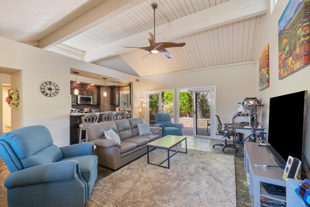 Located just steps from the community pool and top-tier amenities, this stylish and spacious condo offers comfortable desert living at its best. Featuring soaring vaulted ceilings, this light-filled home includes a two-car garage, updated interiors, and an open-concept layout perfect for entertaining or relaxing. Enjoy access to resort-style amenities, including pickleball and tennis courts, all within a well-maintained community in the heart of Rancho Mirage. Whether you're seeking a full-time residence or a vacation getaway, this property combines convenience, comfort, and a highly desirable location.