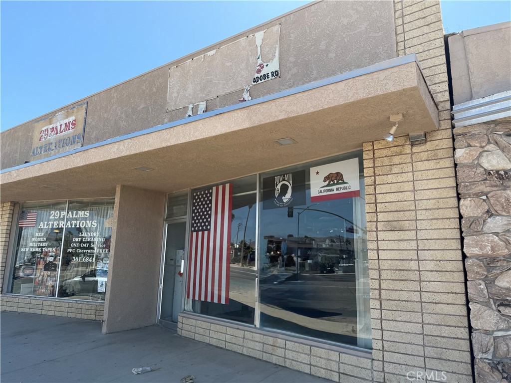 Excellent investment opportunity in the heart of downtown Twentynine Palms! This well-located commercial property features three units, with two long-term tenants in place and one currently vacant—ideal for an owner-user or investor. Included in the sale is an additional lot located directly behind the building, offering potential for expansion or additional parking. Convenient parking is available both behind the building and along Adobe Road. Located just minutes from the entrance to Joshua Tree National Park and the Marine Corps Air Ground Combat Center, this property benefits from strong traffic and consistent demand. Don’t miss out on this versatile income-producing asset!