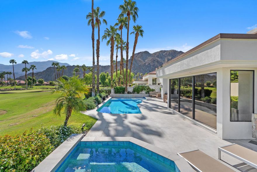 Incredible Southern views highlight this highly upgraded Classic 100 floor plan located on the prestigious Palmer Private Course at PGA West. From nearly every room, you'll enjoy sweeping panoramas of the sparkling lake, the lush10th fairway, the private clubhouse, and the dramatic backdrop of the Santa Rosa and Coral Mountains.A private, gated courtyard sets the stage for the highly upgraded refined interiors within. Step inside to a light-filled great room with high ceilings, a cozy fireplace, and a full wet bar with refrigerator, ideal for both intimate evenings and grand-scale entertaining. Expansive sliding doors capture the unforgettable scenery and blur the lines between indoor and outdoor living.The upgraded designer kitchen is a true showpiece, blending beauty and functionality with sleek quartz countertops, a large center island, walk-in pantry, abundant cabinetry, and all-new stainless-steel appliances. Designed for connection, the kitchen flows seamlessly into the formal dining and family areas, creating the perfect gathering space for family and friends while showcasing panoramic views.The primary suite is a serene retreat, opening to a private courtyard with Santa Rosa Mountain views. A large walk-in closet and spa-inspired bathroom complete the suite, featuring a soaking tub, walk-in shower, bidet, and abundant built-in storage. Two additional en-suite guest rooms offer comfort and privacy, ensuring every visitor feels at home.Step outside to one of the most coveted vantage points in all of PGA West. The recently resurfaced pebble tec saltwater pool and spa are enhanced by a soothing water feature, tanning deck, and brand-new, top-of-the-line non-slip tile. Fully automated with smartphone technology and outfitted with all-new equipment, this resort-style escape was designed for effortless desert living.