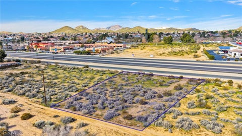 Photo of 0 Outer Hwy 18, Apple Valley, CA 92307 (MLS # HD26127866)