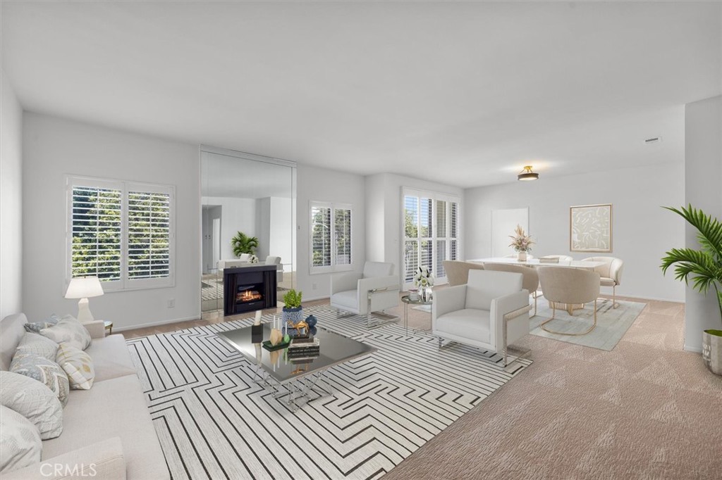 One of the lowest price per square foot condos available in the heart of Westwood! This 2 bedroom plus den, 2 bath unit has been recently refreshed and spans over 2,000 sf of living space! The massive living room and dining area are flooded with natural light and feature high ceilings, walls of windows, a cozy fireplace and a sliding door to the balcony overlooking the charming tree-lined street. The well-appointed kitchen has an abundant amount of storage and leads to a cozy breakfast area overlooking the neighborhood. A large primary bedroom includes tons of closet space and a recently upgraded bathroom with a massive shower and dual vanities sinks. Aside from another spacious 2nd bedroom, the unit includes a den which is perfect for an office or a 3rd bedroom if needed. Other features include fresh paint and newer carpet throughout, plantation shutters, central heat and air, and in-unit laundry. The HOA has recently taken care of major updates including the roof and elevator, ensuring peace of mind for major expenses. The building is equipped with a gated garage with 2 assigned spots, guest parking, security cameras, community room, gym, and sauna. This unit is located in the coveted Westwood Charter School District and situated close to everything that Los Angeles has to offer. Easy access to UCLA, Westwood Village, Century City, Beverly Hills, and the freeways. Enjoy living within close proximity to some of the world's finest dining and shopping. Don't miss out on this tremendous opportunity to make it your own!