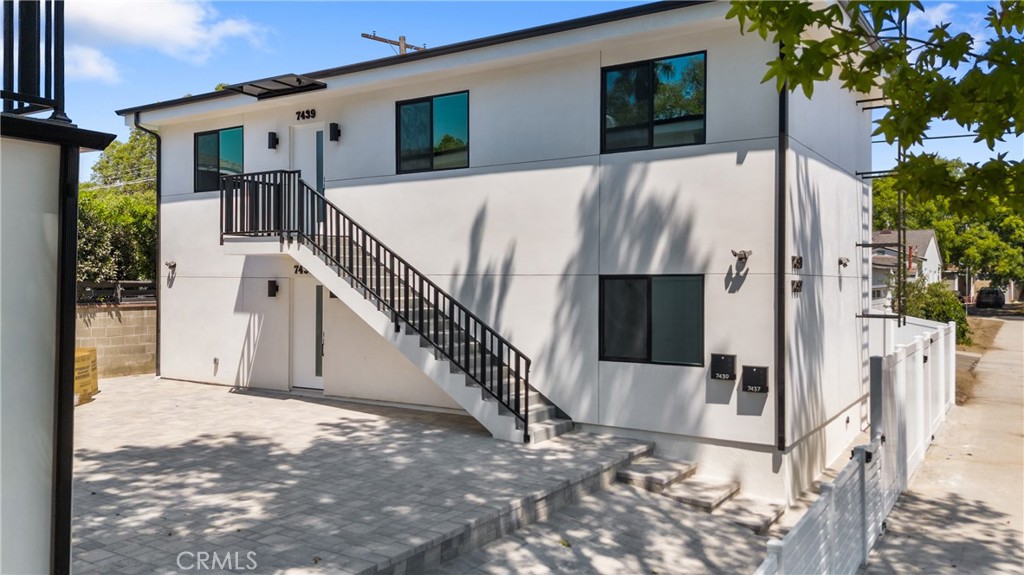 Welcome to 7439 Ranchito Ave – a brand-new all-electric residence combining modern design, energy efficiency, and elevated living on the second floor.
This thoughtfully designed 2-bedroom, 2-bathroom unit features wide-plank flooring throughout, recessed lighting, and oversized windows that flood the space with natural light. The open-concept living and dining area flows into a stylish kitchen with quartz countertops, custom cabinetry, and stainless steel appliances. The primary suite offers a spacious closet with built-ins and a sleek en-suite bath with dual vanities, designer tile, and a frameless glass shower. A secondary bedroom and bath provide versatility for guests, family, or a home office. Both bathrooms are finished with contemporary details and matte black fixtures.
Additional Highlights: All-electric unit with solar panels for reduced utility costs - Private balcony with tree-top views - In-unit laundry hookups - Central air & heat with modern ducting - Gated property with secured entry - Located in a quiet Van Nuys neighborhood near shopping, dining, schools, and freeway access, this home offers both comfort and convenience.
