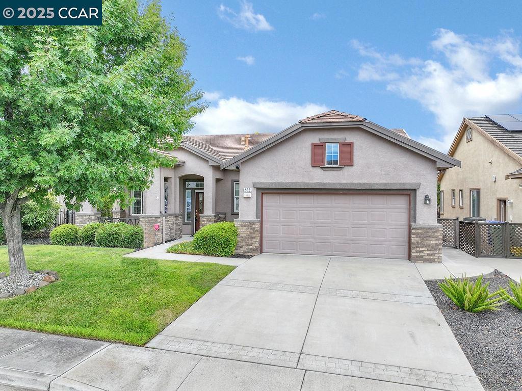 Located in Summerset 3, a Gated Senior Community. The “Cornell Model” in a court location. This 2-bedroom, 2 bath home has 1,734 sq ft of living space and a 2.5 car garage with room for that golf cart. Remodeled kitchen with Granite counter, beautiful maple cabinets, stainless steel appliances w/gas stove/oven, microwave, dishwasher, sink, refrigerator, custom lighting & a large dinette area. A large family room with a gas fireplace with ceiling fan, custom window covers and Engineered Hardwood flooring. A single door entry to the formal living room and dining. The hall bathroom has a tub/shower combo with new shower glass doors. A large primary bedroom with a bay window and walk-in closet. The primary bath has double sinks, new frameless stall shower glass & custom marble walls and a separate tub. The backyard is very charming with a patio & cover and plenty of mature plants for some privacy, grass, nature gas for your barbecue & a fence for your doggie family. Summerset 3 - The HOA is $175 monthly and includes swimming pool, hot tub, gym, tennis, bocce ball, activity clubs to join, dinners & dances, security gates & more. Just minutes away from Kaiser Hospital & John Muir, Safeway & CVS.