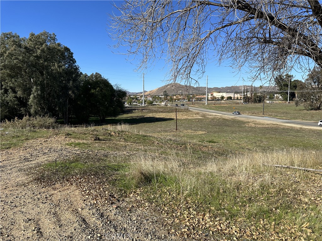 HARD TO FIND 6+ ACRES WITH I-15 FREEWAY VISIBILITY LOCATED AT THE BUSIEST OFFRAMP IN THE DYNAMIC, GROWING CITY OF LAKE ELSINORE. THE I-15 AND HWY 74 COMMERCIAL CORRIDOR IS HOME TO A SUPER WALMART, COSTCO, LOWES HOME IMPROVEMENT, LA FITNESS, CHILI'S, CHICK-FIL-A, JERSEY MIKES AND MANY OTHERS . OFFERING CONSISTS OF 6 PARCELS, SITS AT INTERSECTION OF 2 STREETS , AND IS ZONED C-2. MANY POSSIBILITIES.