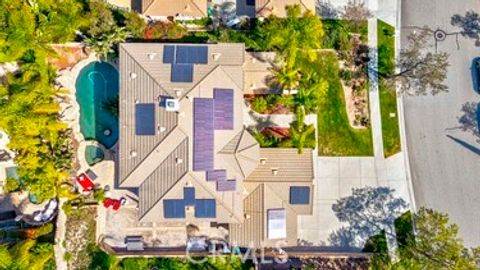 Photo of 1749 Tamarron Drive, Corona, CA 92883 (MLS # IG26056160)