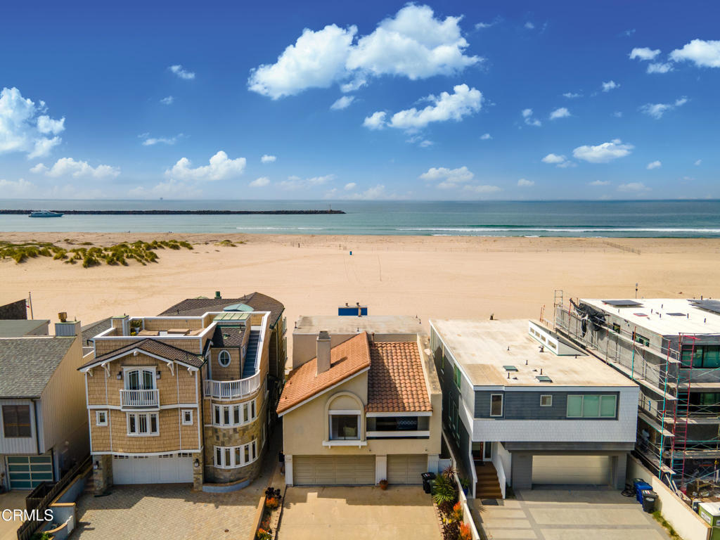 Beautiful beach front home located on the sand at Hollywood Beach. Discover paradise and call one of the most sought after beaches home. This turn key 4 bedroom, 3 bath beach house has ample room for relaxing or entertaining, with stunning unparalleled views of the water, pristine uncrowded beach, and Channel Islands. Experience sunset views like never before while enjoying the peaceful sound of waves breaking and the soothing ocean breeze. Enter on ground floor level to a spacious living room with sliding door direct to the beach, and an outdoor patio excellent for entertaining outdoors on the sand. Ground level additionally has two bedrooms, full bath, and garage. Upstairs second floor walk into the spacious, open concept living/kitchen. Sliding doors open to a deck with breathtaking views. Vaulted ceilings and bright open living space flow into the remodeled kitchen complete with stainless appliances, quartz countertops, and a spacious, wide open feel. Laundry room, second bathroom, and primary bedroom with en-suite bathroom located on second level. Third floor is a spacious 4th bedroom. Walk directly across the street to the Channel Island Habor where you will find miles of tranquil walking and bike paths, restaurants, shops, and activities such as jet skiing, kayaking, stand up paddle boarding, and electric boat rentals. Walk to the Sunday Farmers' Market in the Marina for fresh produce and locally caught seafood. Experience beach living like never before!