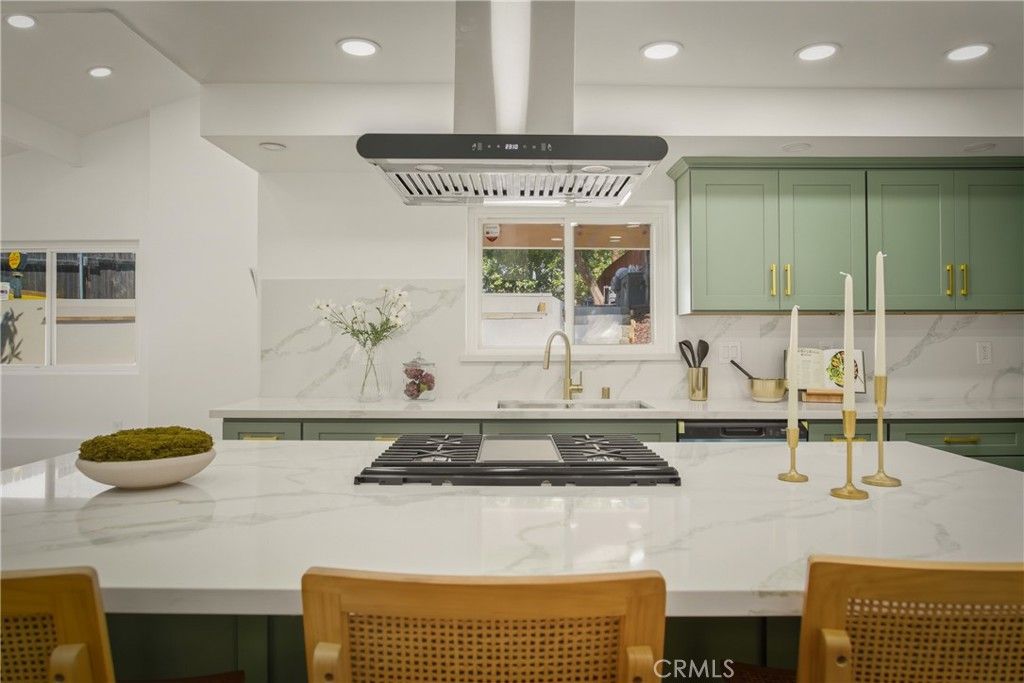 Photo of 6150 Strickland Avenue, Los Angeles, CA 90042 (MLS # DW26025568)