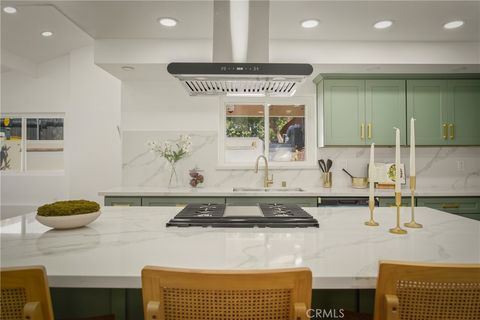 Photo of 6150 Strickland Avenue, Los Angeles, CA 90042 (MLS # DW26025568)