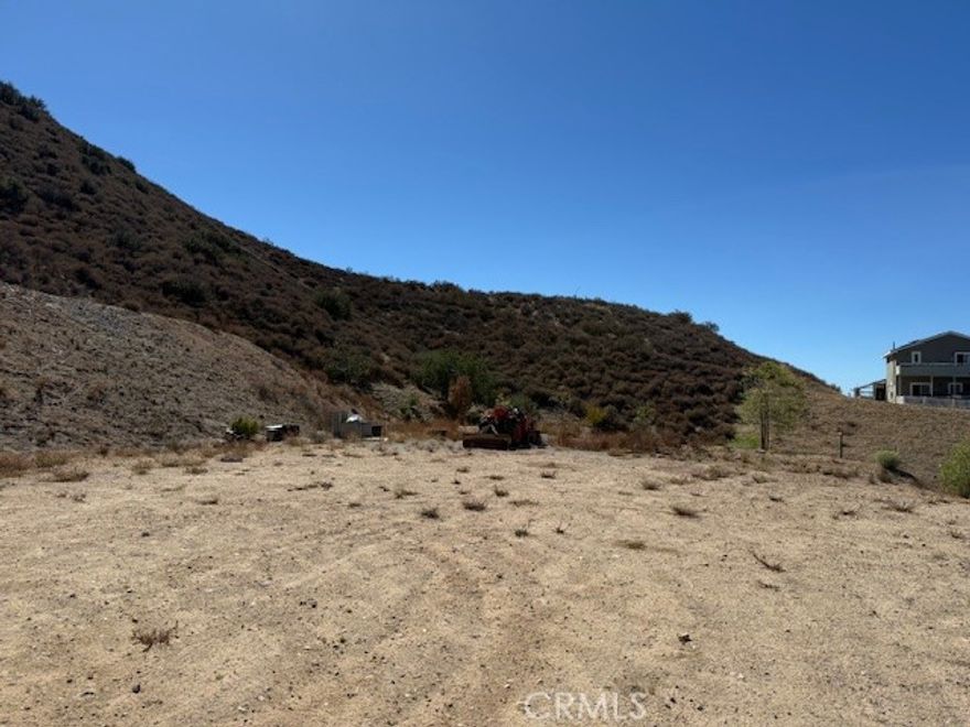 Gorgeous view! Roughly one half acre flat as a pancake, yet only a mile away from Agua Dulce Canyon Rd/ Sierra Highway. Water well information is forthcoming. The subject property lies next door to 10854 Pellona Rd, a 2-story house. Sellers own a home locally and got fed up with the building process. Directions to Property: Sierra Hwy to Pellona Road. Go south on Pellona Road and then west (right) up a slight hill. Please do not drive down Dale Road. It is a private street and the subject property does not have access from Dale Road.