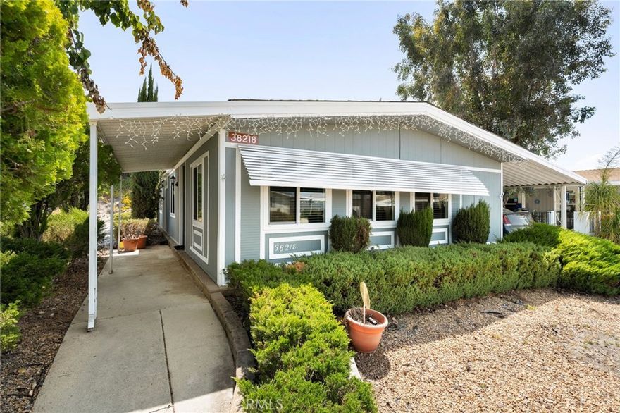 Discover this beautifully maintained, single-story home nestled in the highly desirable 55+ community of Warm Spring Knolls in Murrieta. Perfectly situated in a quiet, friendly neighborhood with plenty of activities to enjoy, this residence offers comfort, convenience, and a welcoming atmosphere.

As you step inside, you'll immediately notice the open layout filled with abundant natural light. The well-equipped kitchen includes a refrigerator that remains with the home, making moving in easy. The spacious master bedroom features a recently added walk-in sit-down tub for easy access, enhancing comfort and safety.

This home boasts two generous bedrooms and two full bathrooms, along with a private indoor laundry room where the washer and dryer will also convey. Throughout the home, ceiling fans help keep you comfortable, complemented by stylish vinyl wood-like flooring and plush carpeting in the bedrooms.

Enjoy outdoor relaxing on the covered side patio, or take advantage of the recently refurbished large shed in the backyard. The home is built on a 433 foundation, ensuring it's financeable. Recent upgrades include a roof replaced approximately 8 years ago, water heater replaced 3yrs ago and upgraded double-pane windows for energy efficiency.

Located close to shopping, hospitals, and major freeways, this home combines convenience with a vibrant community lifestyle. The clubhouse offers a variety of activities to suit your interests, making this an ideal place to enjoy your retirement years.

Come see this beautiful home and friendly neighborhood in person — your new chapter awaits!