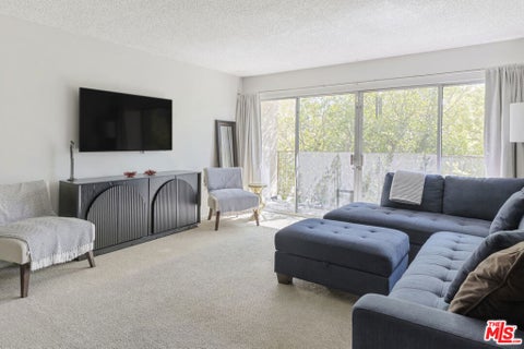 Photo of 6771 Springpark Avenue #102A, Los Angeles, CA 90056 (MLS # 26102598)