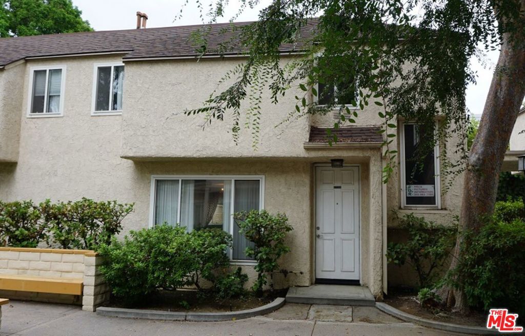 Move-in to this Fantastic 3 Bedroom 2 1/2 Bath End Unit Townhouse in Tarzana Oaks Complex. This Bright and Airy Unit features Engineered Hardwood Floors, New Energy Efficient Recessed Lighting and New Paint throughout, along with Crown Molding and step down Living room with Fireplace. Kitchen has White Cabinets, Quartz Counter-tops and Glass Tiled back splash, Eating area which opens out to your Private Back Yard. Bathrooms updated with White Vanities and Designer Tiles. Larger Bedroom has Cathedral Ceiling, 2 Large Closet and it's own Private Bath. This Unit is Facing Small Courtyard Walkway with Trees and Flowers, Close to the Gated Community Pool and Private Two Car Garage. Ready for a quick, short escrow with NO Drama. Priced to sell.