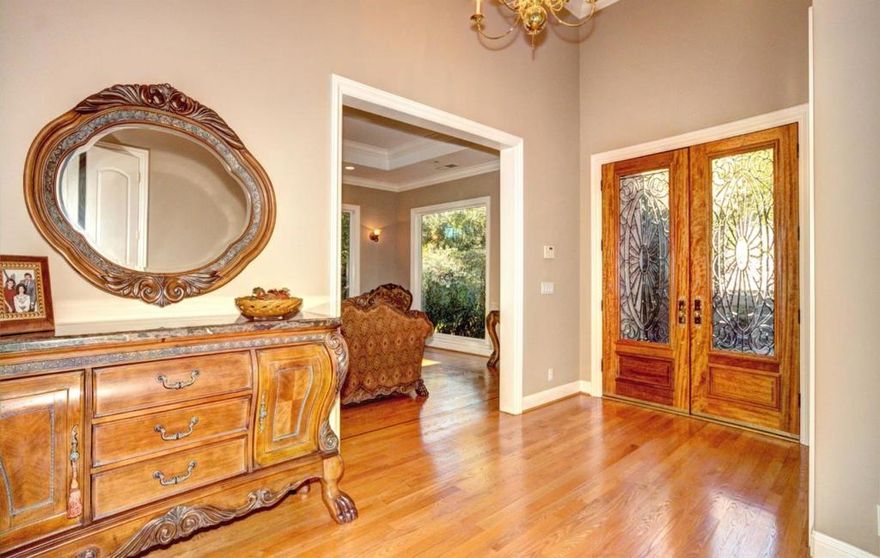 This Custom House was built in 2005/06 and was originally designed as a 5br/4.5ba/FR/DR/LR/ and with the option to have an attached (with separate entrance) in-law unit (ADU) and an oversized 3 Car Garage of approximately 4,500sqft. on over one acre. Seller has also furnished another preliminary plan sited for a separate ADU at the lower portion of the lot that would need an additional approval from the appropriate authorities. Seller at "buyers option" will complete any of the unfinished areas '"upon mutual agreement" as to the finishes best suited for them. Pictures of the the unfinished Rooms have been "Virtually Staged"