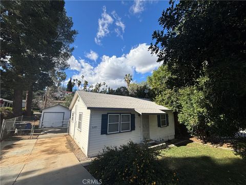 Photo of 5093 Olivewood Ave, Riverside, CA 92506 (MLS # IV26036964)