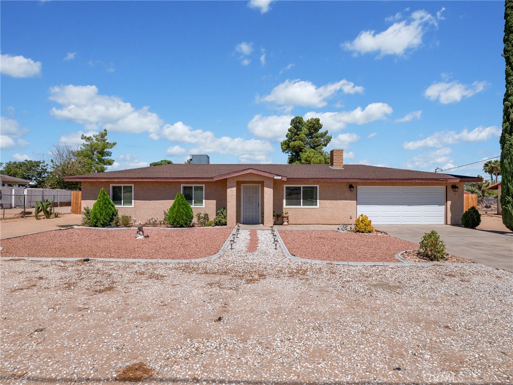 Welcome to 14572 Appleton Street in Hesperia is a well-maintained home that blends comfort, functionality, and space on a generous half-acre lot. Built in 1980, this single-story property offers three bedrooms and two bathrooms with 1,196 square feet of living space. Inside, you’ll find newer carpet that adds warmth throughout, a welcoming living area complete with a cozy fireplace, and a kitchen enhanced by granite countertops that bring both durability and style. A recently installed water heater provides peace of mind, while the property’s electric fence powered by solar adds extra convenience and efficiency. With its expansive lot, there’s room to create the outdoor lifestyle you’ve been dreaming of, whether it’s gardening, entertaining, or simply enjoying the wide-open space. Located near schools, shopping, and commuter routes, this home is ready to offer both comfort and opportunity to its next owner.