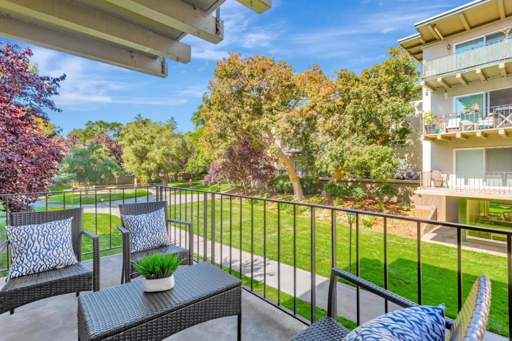 Enjoy living in this spacious condo with updates, a new bathroom vanity, kitchen countertops, recessed lighting, and light fixtures. This is one of the larger 1-bedroom units in the complex. Come and be surprised at the large walk-in closet. The living room is filled with natural light and has access to the balcony that overlooks the greenery. The condo is a short walk to the playground, large pool, gym, community center, and tennis courts. It is a short walk to Woodlake Shopping Center. It is also located on the border of Burlingame, which offers easy access to downtown Burlingame shops and restaurants within a short distance. Assigned parking space #65 & additional assigned storage.