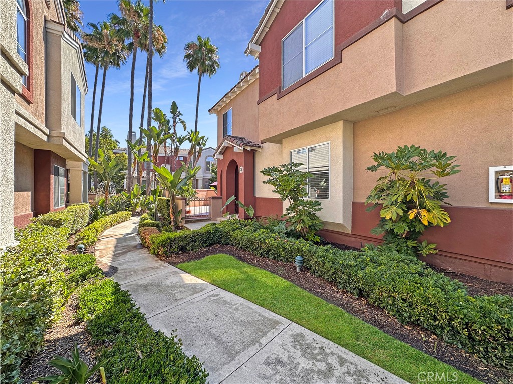 Welcome to 76 Anacapa Court— a beautifully maintained 3-bedroom, 2.5-bathroom corner-unit townhome located in the desirable Vineyards community of Foothill Ranch. This rare end unit offers exceptional privacy with no neighbors above or below, along with one of the largest wraparound patios in the complex— perfect for morning coffee, cozy evenings outdoors, or weekend entertaining under the stars.
Inside, you'll find a bright and open floor plan featuring recessed lighting, laminate flooring, and a cozy fireplace that adds warmth and charm to the living space. The kitchen offers stainless steel appliances, granite countertop, a walk-in pantry, a breakfast nook, and ample storage—creating a functional and welcoming space for everyday living or entertaining.
Upstairs, the spacious primary suite features vaulted ceilings, a walk-in closet, and a beautifully upgraded ensuite bath with dual sinks, granite countertops, and a sleek shower/tub combo with sliding glass doors. Two additional bedrooms share a beautifully updated bathroom featuring a frameless glass walk-in shower with brushed gold hardware, a granite countertop vanity, and designer lighting—offering both style and function for family or guests.
Additional highlights include an indoor laundry area, a main-level powder room, and direct access to an attached two-car garage. Residents of The Vineyards enjoy access to resort-style amenities including a sparkling pool, relaxing spa, playground, and beautifully landscaped common areas.
Ideally situated near top-rated schools, hiking and biking trails, Whiting Ranch Wilderness Park, and just minutes from shopping, restaurants, and the 241 Toll Road—this beautiful home combines comfort, style, and convenience in one of Foothill Ranch’s most desirable communities.