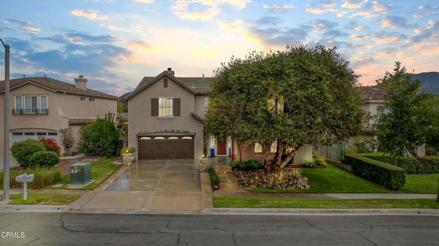 Welcome to this beautifully appointed 4-bedroom, 3.5-bathroom single-family home located in the heart of Newbury Park. Step through the front doors into a dramatic double-height foyer that flows seamlessly into a light-filled, open-concept living and dining area, perfect for both everyday living and sophisticated entertaining. Custom tile flooring and a grand chandelier set the tone for refined elegance. The formal living room features a cozy fireplace, while the expansive dining area, highlighted by a centered chandelier, provides ample space for memorable gatherings. The chef's kitchen is a dream, featuring abundant counter space and cabinetry, a center island, recessed lighting, built-in oven, microwave, and dishwasher. Adjacent to the kitchen, the inviting eat-in area perfect for your morning coffee. The warm and welcoming family room is complete with a stunning stone fireplace and lots of natural light. Also on the main level is a versatile bonus room, ideal as a home theater with surround system, home office, or guest quarters, offering flexibility to suit your lifestyle. Upstairs, the plush, carpeted staircase is accented with custom wrought iron railings, guiding you to a spacious primary suite filled with natural light. Enjoy recessed lighting, a generous walk-in closet, and a luxurious ensuite bath featuring dual vanities, a large soaking tub, and a walk-in shower. Three additional well-sized bedrooms and a convenient upstairs laundry room complete the upper floor. Step outside to your private backyard oasis, perfect for year-round entertaining. Enjoy a sparkling pool, relaxing spa, and lush landscaping with waterfall that offers beauty and tranquility in equal measure. Conveniently located near shopping centers, scenic hiking trails, parks, top-rated schools, and more, this home combines comfort, style, and an unbeatable location.