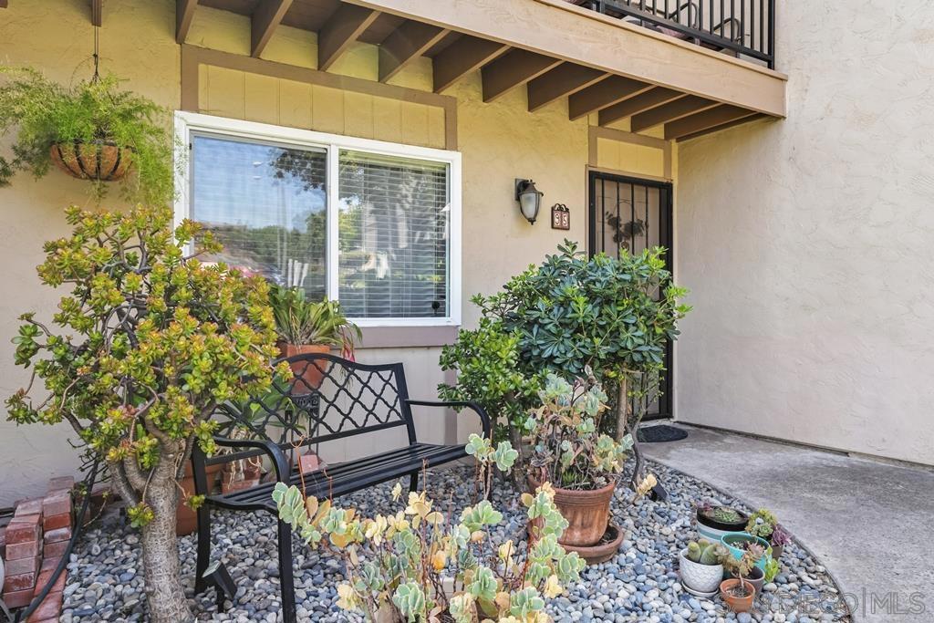 Charming 2bd/1.5 ba Townhouse home in the peaceful Glen Park community. This nicely updated home boasts newer wood flooring, and an updated kitchen with quartz countertops. Relax on the spacious patio and enjoy the tranquil surroundings of the greenbelt and common areas. Two parking spaces include a side-by-side garage with storage and an additional parking space. This property lies within the highly acclaimed La Mesa school district and is just a 15-minute drive to the beach. This convenient location is just a short drive to shops restaurants, and Lake Murray. First class amenities include: Pool, spa, playground, community room,and pickle ball court.