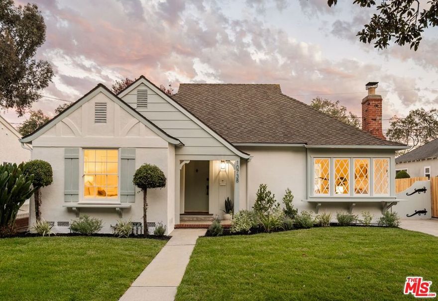 First time on the market in over 70 years, this charming Culver City treasure blends timeless craftsmanship with thoughtful modern updates. Nestled in the coveted Vets Memorial Park neighborhood, 10738 Barman Avenue stands as a rare legacy home - rich in character, refreshed for today, and ready for its next chapter. Originally owned and cherished by a Los Angeles blacksmith in the 1950s, the property still showcases his artisan touch through custom ironwork, including handcrafted driveway gate fixtures and ornate crawl space screens. Held by the same family for generations, this home has been lovingly renewed to highlight its historic soul and enduring quality. Inside, the three-bedroom, one-bath residence glows with natural light and warmth. The living room is graced with storybook picture windows that frame the outdoors and fill the space with sunshine, while a classic wood-burning fireplace anchors the room in cozy charm. Original oak hardwood floors, in pristine condition, stretch throughout, complemented by freshly updated surfaces that harmonize old-world character with modern comfort. The dining room, framed by shuttered doors, sits gracefully between the living area and the kitchen, perfect for gatherings or intimate dinners. The bright, refreshed kitchen features a cheerful breakfast nook wrapped in windows, a brand-new range, and a greenhouse window overlooking the lush backyard. White tile countertops, freshly painted cabinetry, and custom moldings add warmth and personality, while a pantry room with a second sink and direct access to the gated driveway make daily life effortlessly convenient. Each bedroom is generously sized and bathed in natural light, offering privacy and tranquility. The vintage-style bathroom features beautiful tile walls, a separate tub and shower, and a built-in storage cabinet - ready to enjoy as is or personalize to taste. Outside, the newly fenced backyard invites relaxation and connection, with lush green grass, a paver patio for lounging, and a separate dining area ideal for entertaining. Beyond the yard, a detached two-car garage with storage and a flexible laundry area with half bath offer practical versatility - perfect as a dedicated laundry space with room for additional use, whether storage, crafts, or a small home office. The gated driveway provides additional parking, privacy, and security. Located in prime Culver City, just steps from Vets Memorial Park, and moments from downtown Culver, top-rated restaurants, shopping, and renowned schools, this home captures the best of Westside living. A once-in-a-generation opportunity to own a piece of Culver City's history - crafted with care, refreshed with purpose, and ready for its new legacy.