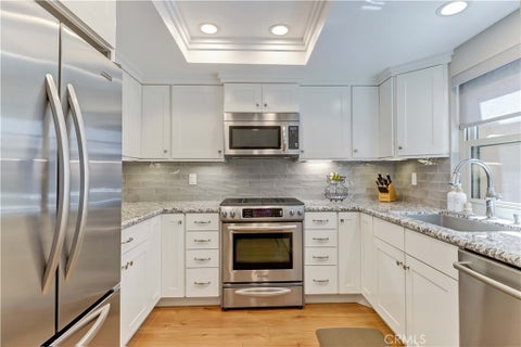 Photo of 8566 Sierra CIR #912-D, Huntington Beach, CA 92646 (MLS # OC26199615)