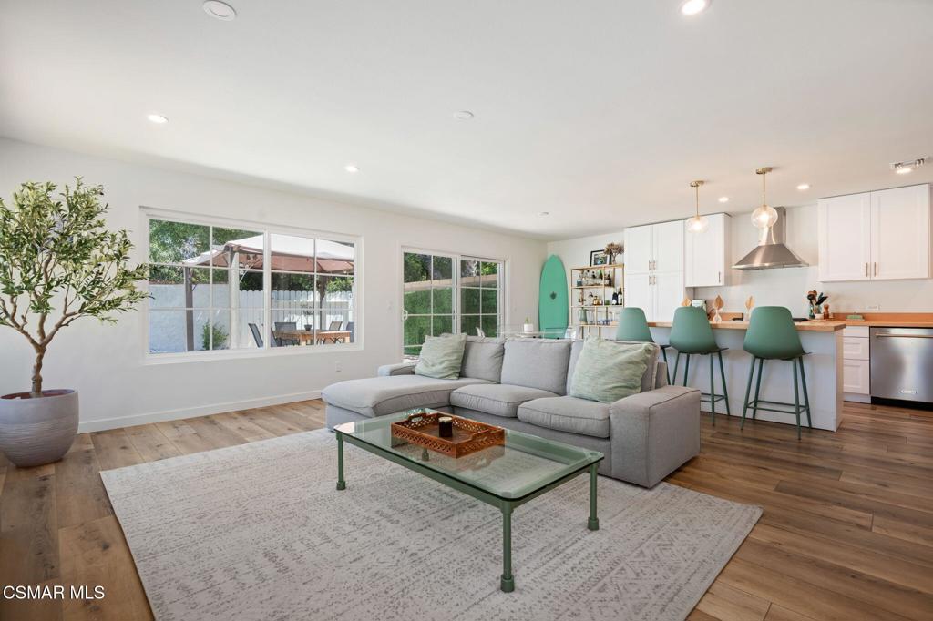 Welcome to this fully renovated 3-bedroom, 2-bath home in Agoura Hills, offering 1,218 sq ft of thoughtfully upgraded living space on a 5,252 sq ft lot. The open-concept layout creates a natural flow from the living room to the dining area and kitchen--ideal for both everyday living and entertaining.The interior is filled with natural light and features brand new luxury vinyl plank white oak flooring, recessed lighting, and energy-efficient double-pane Milgard windows. The kitchen has been completely remodeled with stainless steel appliances, butcher block countertops, shaker cabinetry, and a porcelain farmhouse sink--combining timeless design with modern function.Both bathrooms have been updated with custom ceramic tile and quality finishes. The home also offers excellent storage throughout, with spacious bedroom closets and additional cabinetry that support a tidy, functional living environment. Major system upgrades include a new roof, solar system, and HVAC.A private backyard offers a quiet retreat for gardening, relaxing or entertaining guests. Residents enjoy low HOA dues with access to Lake Lindero Country Club amenities, including golf, tennis courts, an Olympic-size pool, clubhouse, and on-site dining.Conveniently located near local shopping, Costco, Malibu beaches, Pepperdine University, and within the award-winning Las Virgenes School District, this move-in-ready home delivers comfort, efficiency, and lasting value.