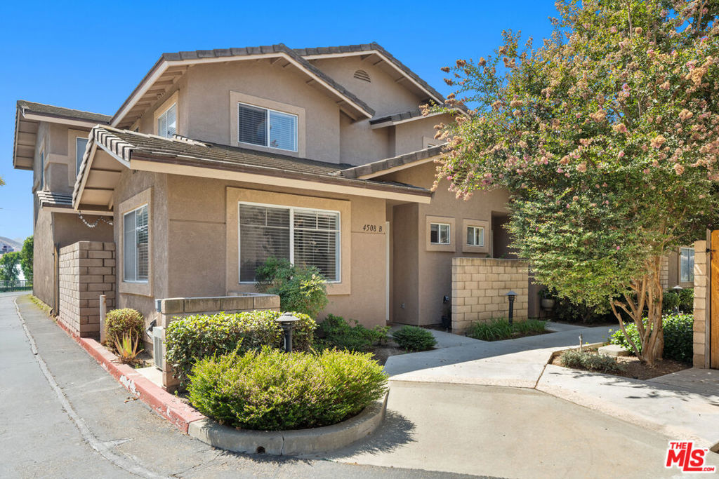 One of the best-priced three bedroom homes in Simi Valley! Welcome to this bright and spacious end-unit townhome offering 3 bedrooms, 2.5 baths, and a private attached 2-car garage. Tucked away in a desirable, tranquil community, this corner unit feels open and inviting with abundant natural light and plenty of privacy. The kitchen boasts generous counter space, ample storage, and a charming pass-through window to the dining area perfect for entertaining. The dining area flows seamlessly to a private patio, ideal for morning coffee or evening gatherings. The family room is filled with windows, creating a warm and airy atmosphere. Upstairs, the primary suite features a private bath and a large walk-in closet. The second bedroom also includes a spacious walk-in closet. Additional highlights include direct garage access, lush community greenbelts, shaded sitting areas, ample guest parking, and the benefit of fewer homes within the community, ensuring a quieter, more private setting. Don't miss this incredible opportunity to own a beautifully maintained home in Simi Valley at an amazing value!