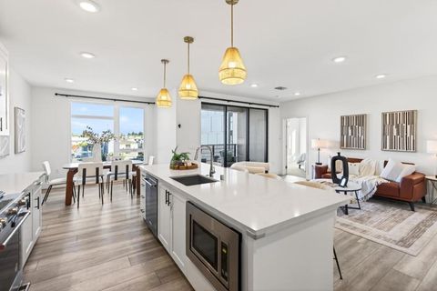 Photo of 3578 Rambla Place #403, Santa Clara, CA 95051 (MLS # ML82037083)