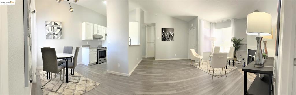 Step into stylish condo living at its finest! This beautifully updated home features an open floor concept that seamlessly connects the living, dining, and kitchen areas—perfect for entertaining or relaxing in comfort. The high ceilings elevate the space with natural light and a sense of airy sophistication. Cook like a pro in the stylish modern kitchen equipped with a high-end smart WiFi stainless steel range/oven, double stainless steel sink and commercial grade kitchen faucet—designed for both function and flair. Every detail reflects a modern home aesthetic, offering the perfect blend of elegance with new luxury vinyl planks flooring throughout, new bathroom vanities with granite countertops, new modern mirrors, in-unit laundry closet with new stacked washer and dryer. Enjoy resort-style amenities with access to a community pool, hot tub/spa and club house. Conveniently located minutes from the Bay Point Bart station and near shopping and restaurants. Whether you're hosting friends or enjoying quiet evenings, this condo offers the lifestyle you've been looking for. Welcome home!