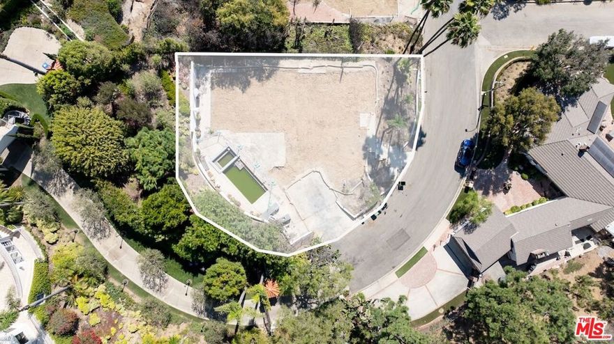 Set on a quiet stretch of Las Pulgas Road, this cleared lot offers a blank canvas in the heart of the Pacific Palisades. Spanning 12,197 sq ft, the property is positioned to capture canyon breezes and sweeping ocean views. With demo and debris removal complete, and an existing pool already in place, the site is primed for new construction, saving valuable time and cost for builders. Utilities are available at the street, and the flat terrain provides a natural foundation for your future residence. The surrounding neighborhood is in the midst of a thoughtful rebuild, underscoring the upside for both families and developers. Beyond the lot itself, residents of Las Pulgas enjoy proximity to Marquez Elementary, Palisades Charter High School, scenic hiking trails, Palisades Village, and the coastline all just minutes away. Whether you envision a modern architectural statement or a timeless coastal retreat, 1322 Las Pulgas presents the opportunity to create a custom home in one of Los Angeles' most coveted communities.
