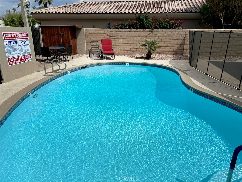 The property is comprised of four units, all single-story cottage style 2 bedroom, 1.5 bath units. The complex has a swimming pool, and each unit comes with 2 carport parking spaces. There are common laundry facilities at the property as well. All units come with new appliances including refrigerator.