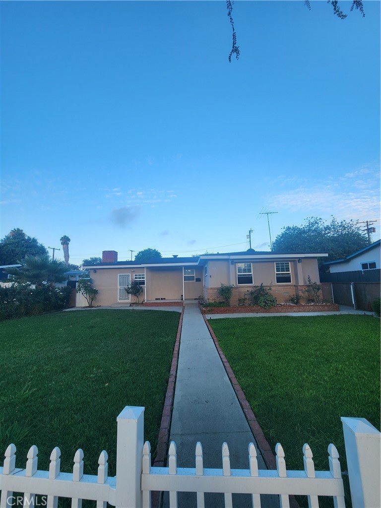 ************************Upgraded & Well maintenance Single Family Residence***********Easy to convert 4th bedroom, Separated LR, Dining room & Family room. New roof, newer dual pane window, new garage door from back isle, newer wall AC, finished Fumigation, new updated Kitchen with Quartz counter top & Backflash, Updated Bathroom, Newer painting, Laminate & Tile Flooring, Newer Dishwasher & Microwave with hood. Spacious room & open concept. Access all side the house & direct access backyard & garage. Large front yard with sprinkler with newer fence. Convenient location to FW, School, Market, Restaurant, Church, park etc.