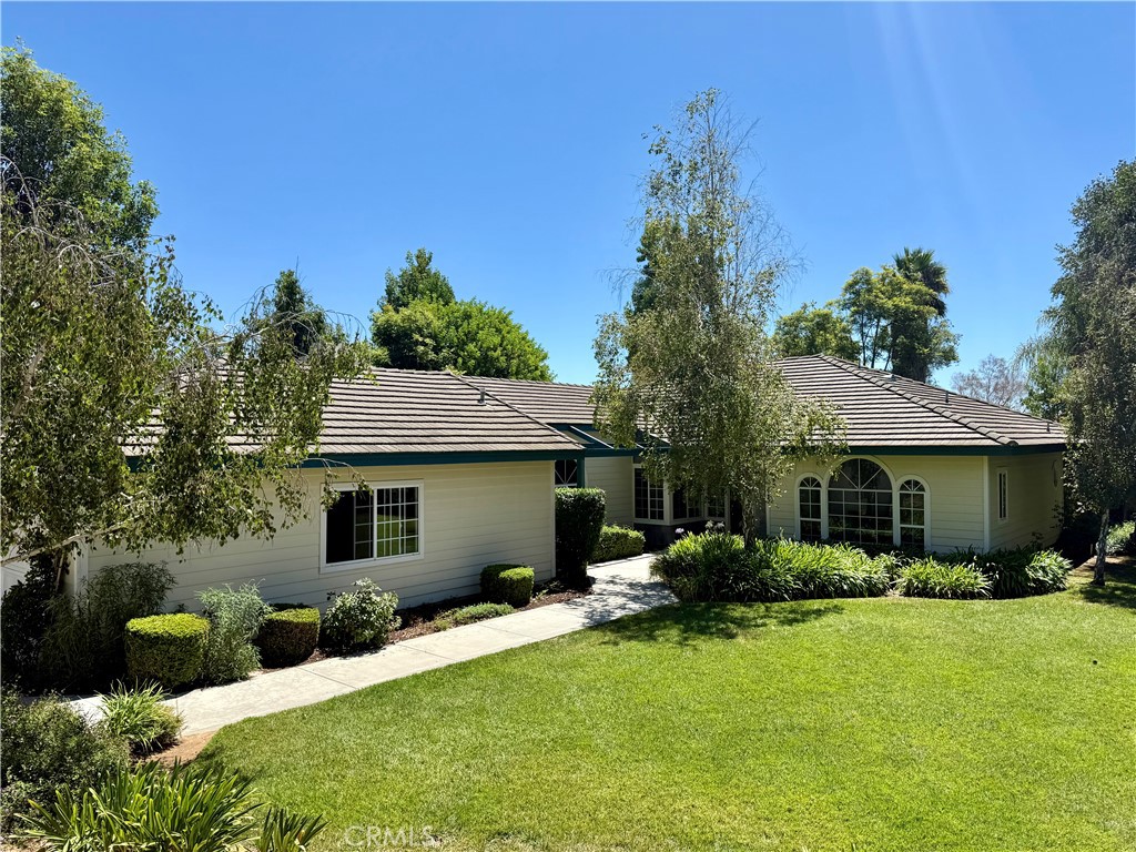 Immaculate 4-bedroom, 2-bathroom, 2,549 sq. ft. home nestled on a serene cul-de-sac in the heart of Fallbrook. Step inside to a bright and inviting great room featuring a vaulted wood-beam ceiling and cozy wood-burning fireplace, seamlessly connected to the open kitchen—perfect for everyday living and entertaining. The home also features a formal dining room and a formal living room, offering added flexibility and charm.
The spacious primary suite is a true retreat, with abundant windows that fill the room with natural light. The en suite bath features a separate tub and shower for ultimate comfort. Situated on a generous .66-acre lot, this property provides ample space for outdoor enjoyment, gardening, or future enhancements. Best of all—no CCRs or HOA restrictions.