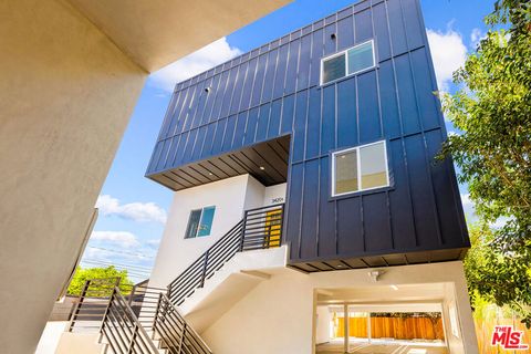 Photo of 3420 12th Avenue #1/2, Los Angeles, CA 90018 (MLS # 26843769)