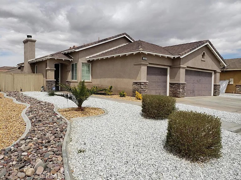 Shows like a model. Custom plantation shutters, porcelain tile and high end carpet. Neutral earth tone colors. Double oven with 5 burner stove top. High end microwave oven and dishwasher. Seperat laundry room. Covered patio/slab 3 car garage with openers on both sides, side yard for boat/RV. Corner lot, great location moments from 15 and 395. Excellent neighborhood. Built 2003. Garage has custom workshop cabinets. Ample storage, landscaped front and back, automatic sprinklers. Tile flooring is 16 set on diagonal. 10# padding under carpet. Custom baseboards, added canned lights in living room for theater experience Klipse speakers mounted in ceiling custom wired in T.V nook for surround sound. Entertainment shelves built into alcove. Association Amenities: None Construction Materials: Mansory Special Features: Cable TV, Garage Door Opener