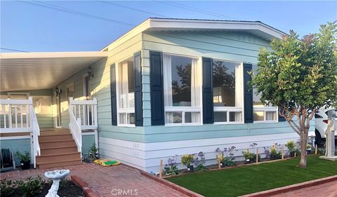 Photo of 16222 Monterey Lane #327, Huntington Beach, CA 92649 (MLS # OC25236351)