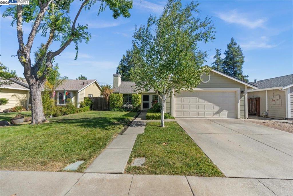 Nicely upgraded home located on a quiet street close to Livermore High and Downtown Livermore. Features include vaulted ceilings in living room, recessed lights, spacious kitchen with maple cabinets, premium flooring and upgraded bathrooms and is equipped for 220v level 2 electric car charger. Well maintained front and back yards with auto sprinklers and a huge shed on the side of the yard. Garage has been professionally converted into a separate laundry room and an office/play area which adds lots more living area. Community pool, playground and tennis court. This one won't last, must see.