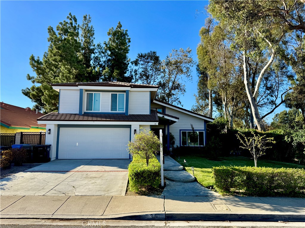 Nestled in the charming Windmill subdivision of Phillips Ranch, this elegant 4-bedroom, 2.5-bathroom single-family home, built in 1980, offers 2,097 square feet of thoughtfully designed living space and sits on a generous ~0.136-acre lot (approximately 5,900+ sq ft). A grand foyer welcomes you with soaring vaulted ceilings that flow seamlessly into the formal living and dining areas, anchored by a striking spiral staircase. Carefully curated updates include rustic double front doors, new flooring (laminate in communal areas, plush grey carpeting on stairs and in all upstairs bedrooms), fresh paint, and smooth-textured ceilings throughout. The remodeled kitchen is a chef’s delight, featuring granite countertops, a gas range, built-in dishwasher and microwave, custom lighting, a tiled backsplash, and a breakfast bar with seating. Both the powder room and upstairs hallway bath have received modern updates for effortless move-in readiness. The master suite is a peaceful sanctuary, complete with dual sinks, updated tile shower and tub, and dual closets for ample storage. Enjoy modern energy efficiency with a paid-off solar system (15 panels), central HVAC, and dual-pane windows. Outdoor living is a breeze with a private pool and spa—perfect for California-style entertaining or relaxing under the sun. Situated just minutes from freeway access and nearby shopping, this location is both convenient and connected. Zoned for top-rated schools—including Diamond Ranch High—this home is ideal for families seeking educational excellence