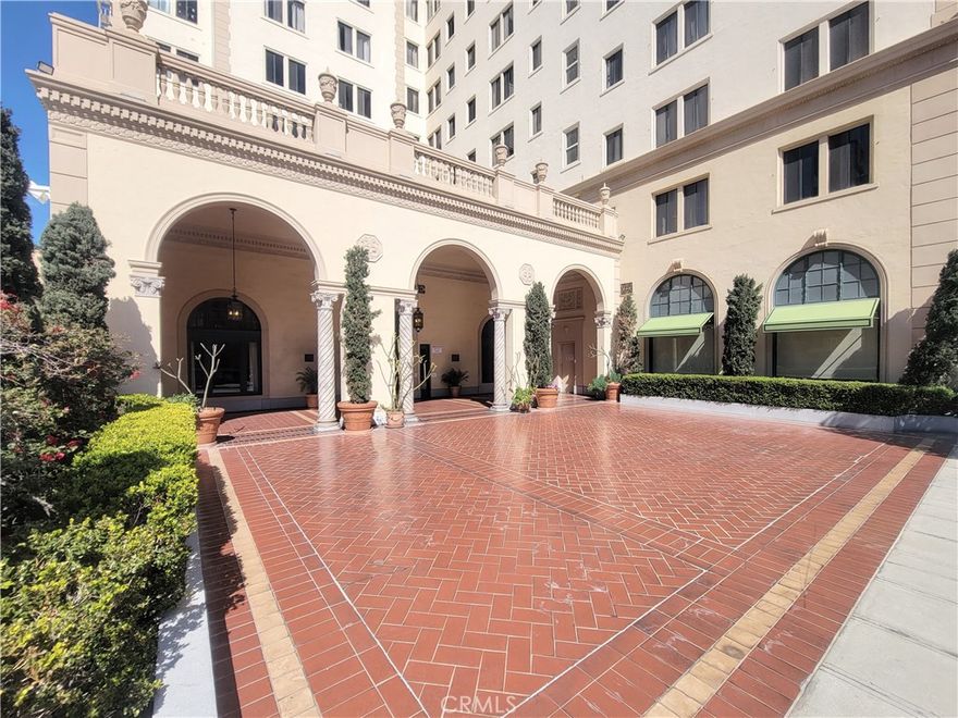This beautiful city-view studio condo is located in the historic Willmore Building. Amenities include an amazing rooftop deck lounge that offers some of the best views of the city, stretching from the Pacific Ocean to the San Gabriel Mountains, along with a roof-top solarium that may be reserved for events. Controlled entry and a beautiful guest lobby are just some of the features of this wonderful community.



Unit 1008 boasts a spacious main living area that features laminate flooring, a bright & fresh paint scheme, a ceiling fan, and an open, free-flowing floor plan that leads to a galley kitchen and attached bathroom. The living room also offers wonderful views of the city from the 10th floor facing east with a Peek-a-boo harbor view. The updated kitchen includes ample cabinets, and quartz counters, and is equipped with a stove, microwave, and refrigerator.



Other features include a separate storage closet, on-site laundry facilities, and enjoy the convenience of water, trash removal, gas and electricity included in your rent.