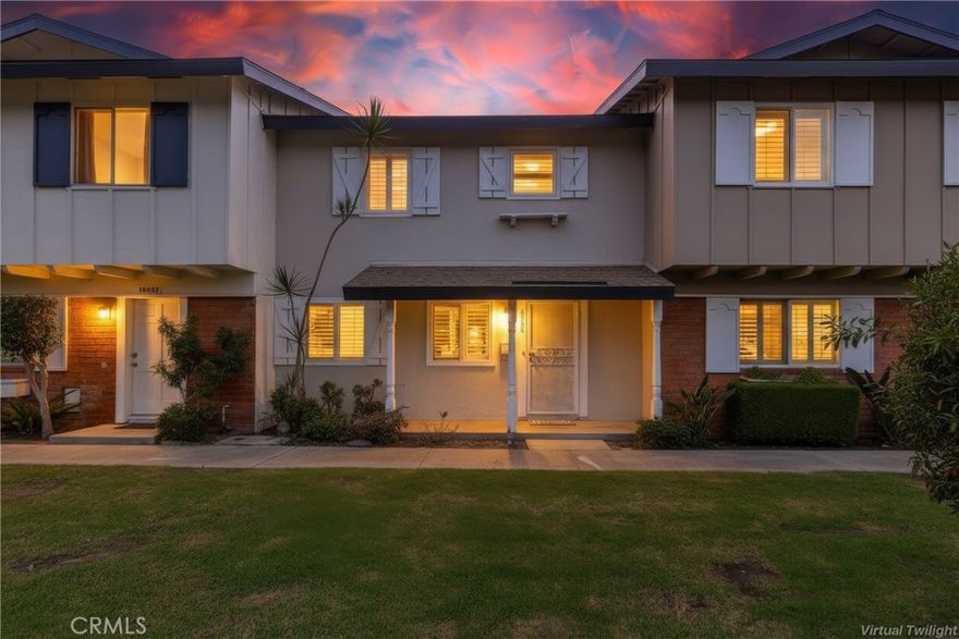 Recently updated Townhome with beautiful improvements including tankless water heater, new toilets, new flooring, lives like a single family residence, no one above or below and ideally situated overlooking a peaceful greenbelt in the desirable Village Townhomes community superbly located within walking distance of local schools and parks, and an abundance of dining and shopping including Whole Foods, The Original Pancake House, Sprouts, Kohls, CVS, Starbucks, Stater Bros Markets, Target, Subway, and MORE! This well-maintained community boasts excellent community amenities including a club house with meeting and banquet rooms, full kitchen, outdoor dining areas, sparkling pool and spa, lounging areas, lighted tennis courts, basketball courts, enclosed Playground, and expansive green spaces. Step through the covered front porch entrance into the home and soak in the light filled living space boasting recessed lighting, plantation shutters, sleek luxury vinyl plank flooring, a fresh neutral palette, and an open concept living area, all setting the stage for an ideal living environment. The spacious living area is open to the dining area with direct access to the patio creating a superb indoor-outdoor living space. The light and bright kitchen has timeless white shaker cabinetry, Quartz countertops, updated hardware and pulls, Stainless Steel undermount sink and faucet, like new 2022 Stainless Steel appliances, Refrigerator included, and a convenient laundry closet with full size washer and dryer. The main level includes a prized guest bathroom with updated vanity and toilet, and walk-in shower. The bedroom level upstairs has luxury vinyl plank flooring throughout, a beautifully updated full bathroom, and 3 bedrooms with recessed lighting. The private enclosed outdoor patio is a peaceful oasis, perfect for relaxing and BBQing with friends and family. Convenient direct access through the patio to the covered carport space in back. Just minutes from local beaches and easy 405 freeway access.